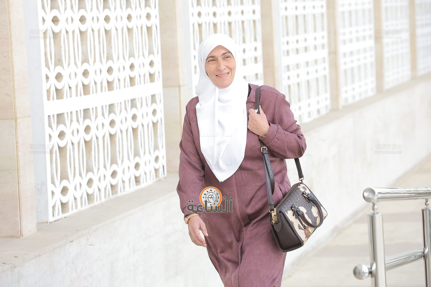 Madar Al-Saa Images 0.5000025645259527