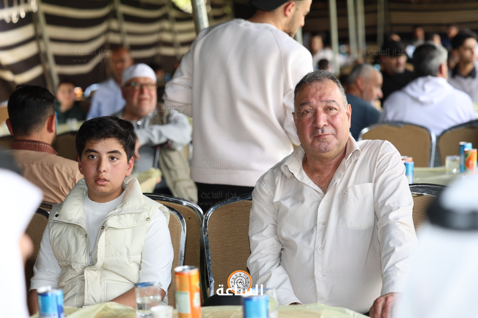 Madar Al-Saa Images 0.6918246518938193