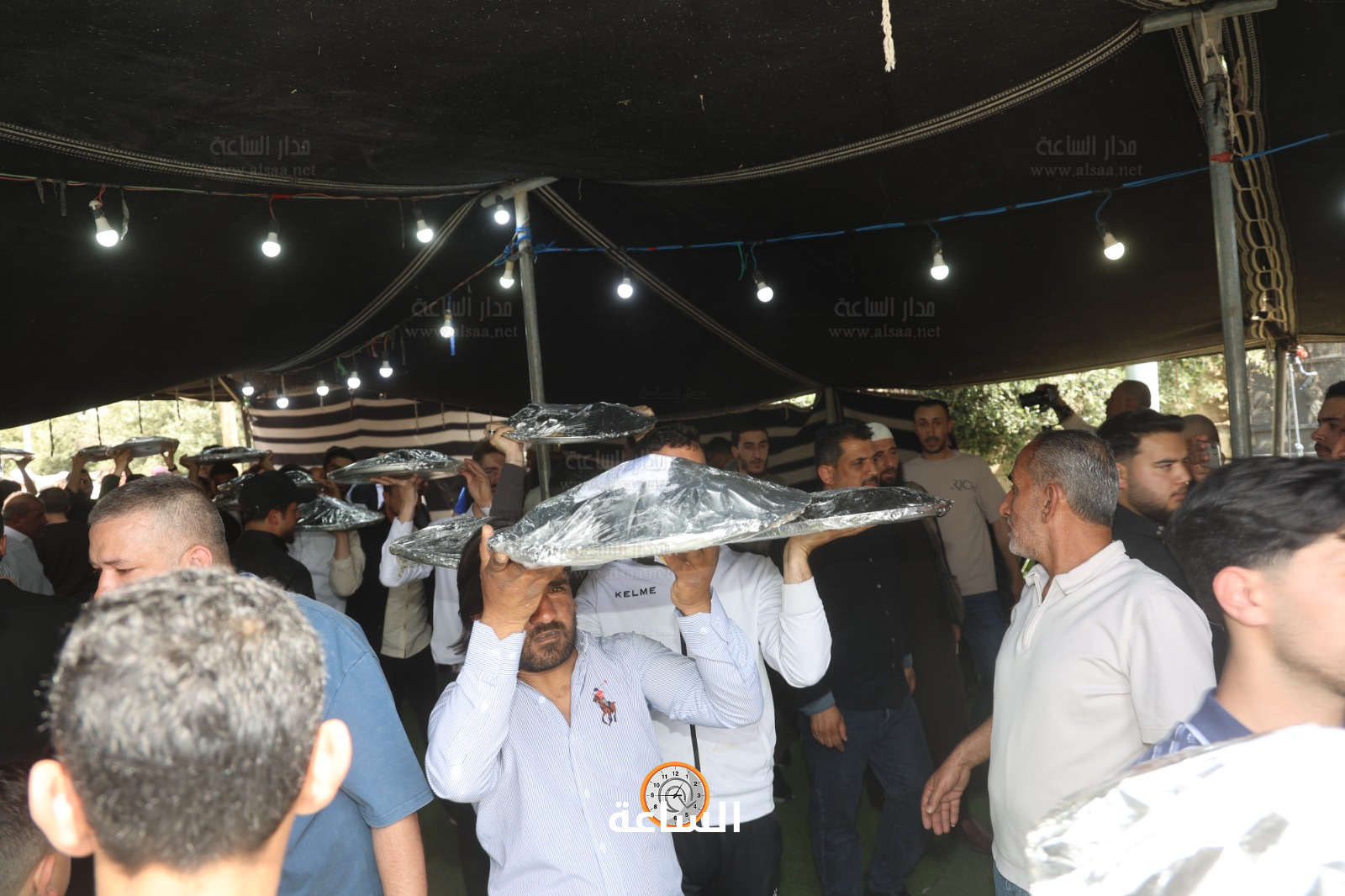 Madar Al-Saa Images 0.926590498934471