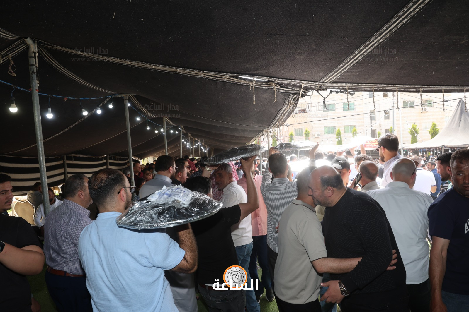 Madar Al-Saa Images 0.555068544010605