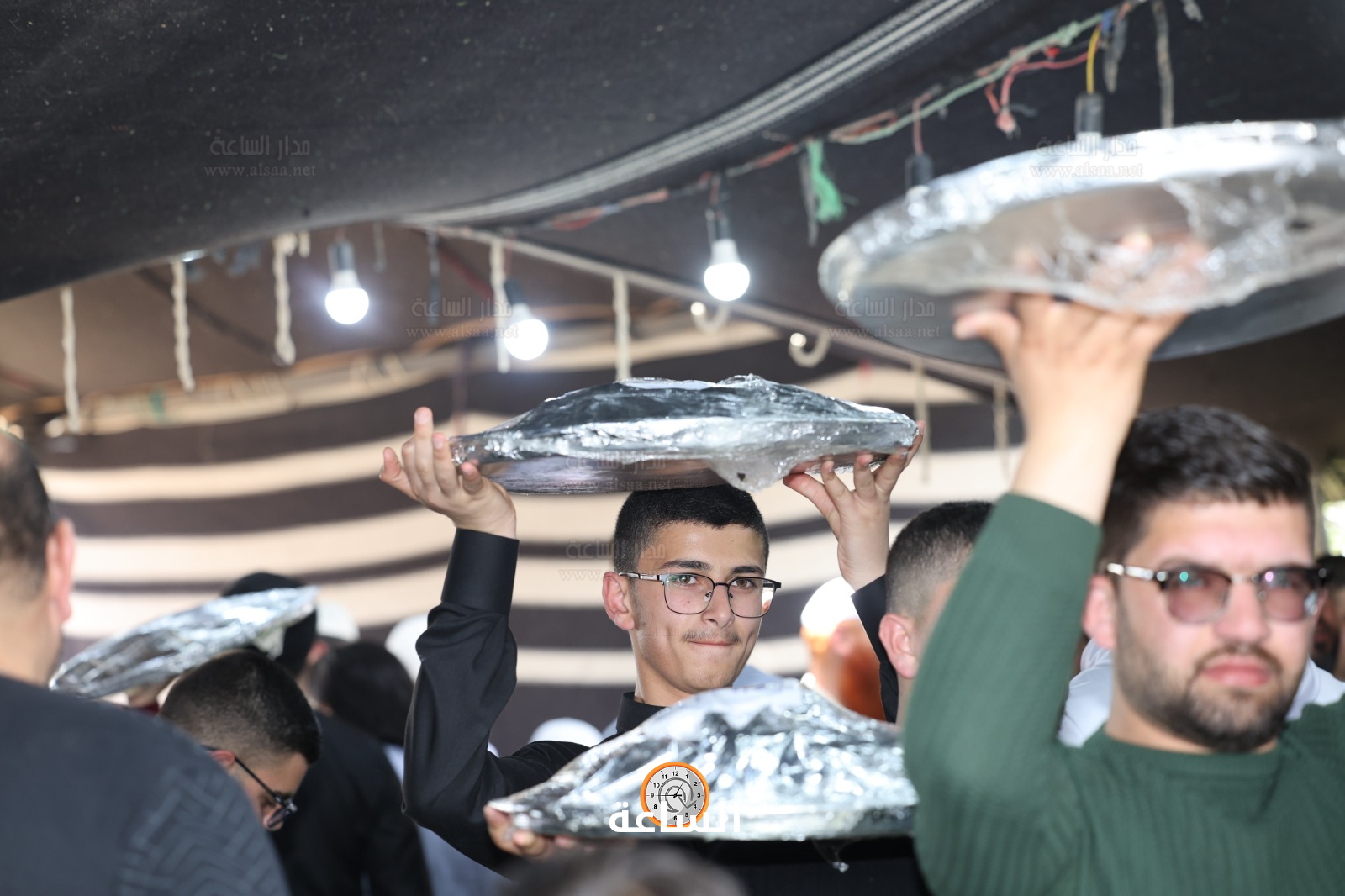 Madar Al-Saa Images 0.24986663896696426