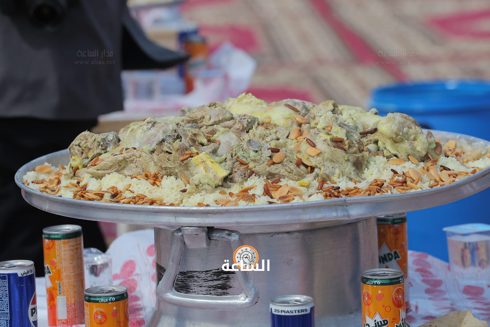 Madar Al-Saa Images 0.9610750546572795