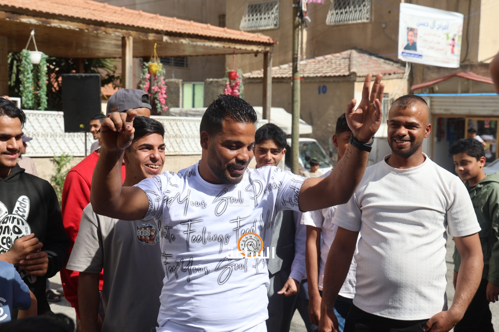 Madar Al-Saa Images 0.6884601360453747
