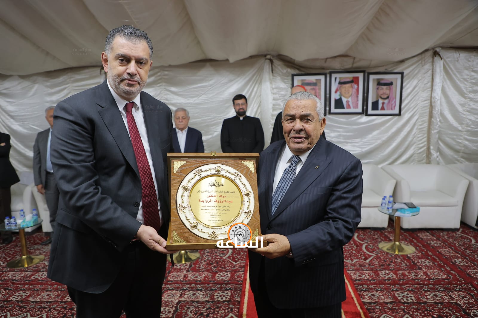 Madar Al-Saa Images 0.755936716076632