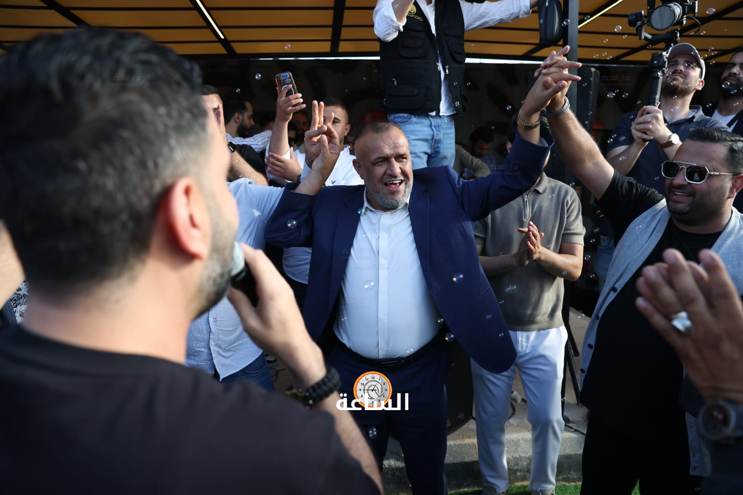 Madar Al-Saa Images 0.6113853986948158