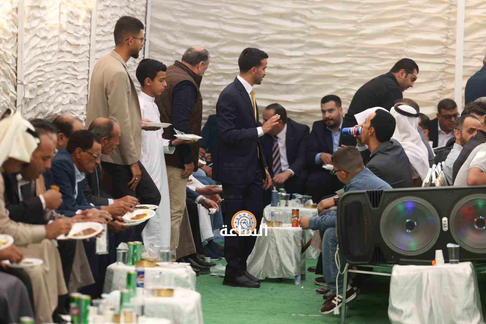 Madar Al-Saa Images 0.7066443672499148