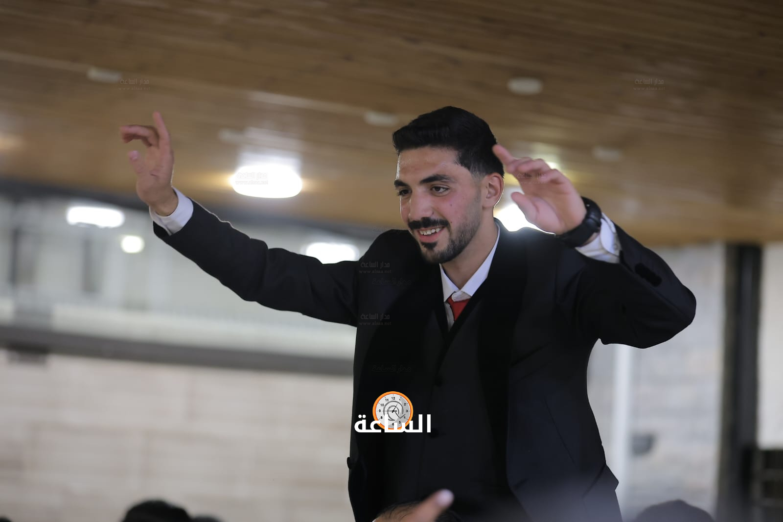 Madar Al-Saa Images 0.6927439160443558