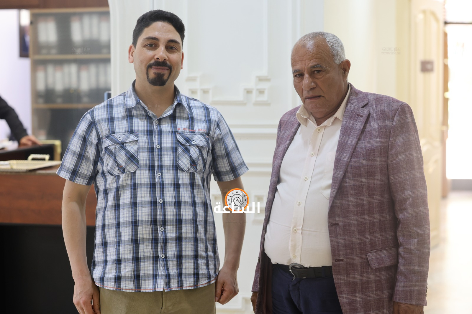 Madar Al-Saa Images 0.512191506739215