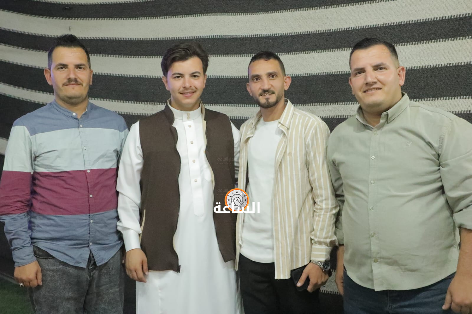 Madar Al-Saa Images 0.6029186274314398