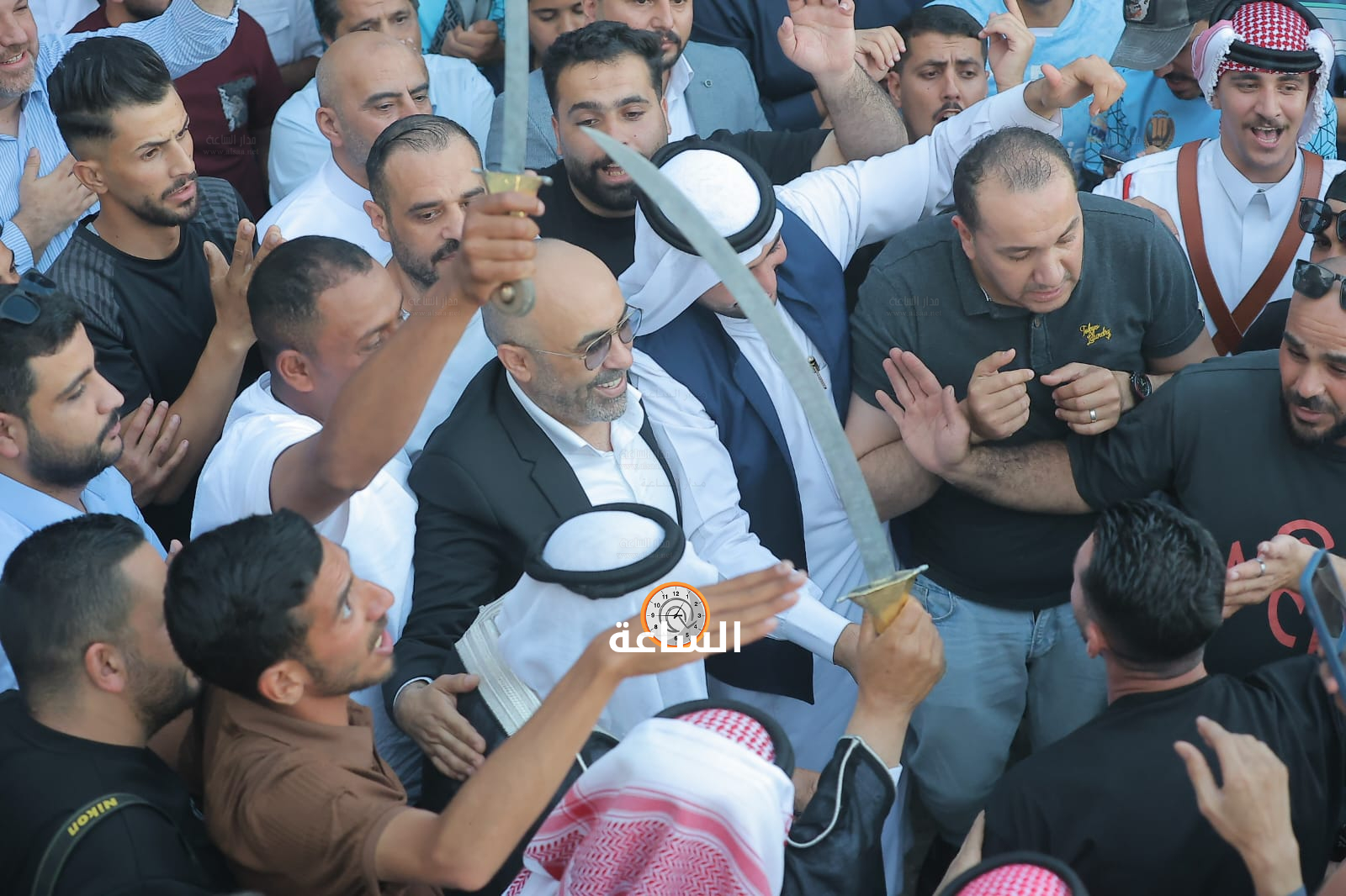 Madar Al-Saa Images 0.49871034925082325