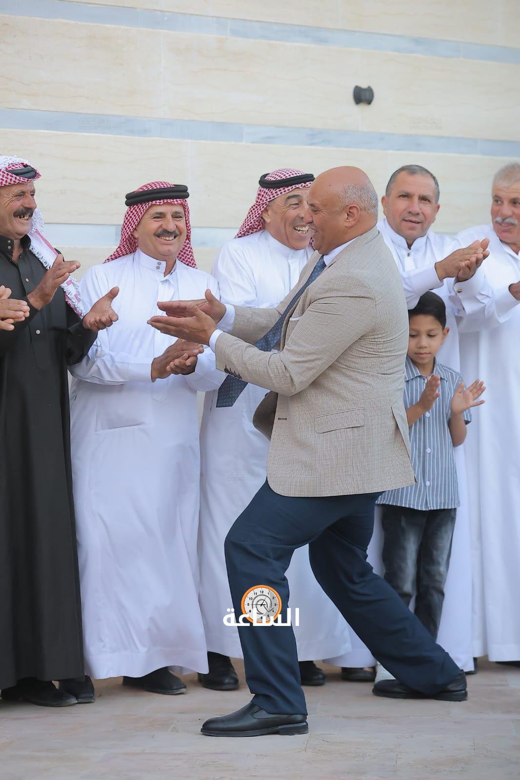 Madar Al-Saa Images 0.472878259556722