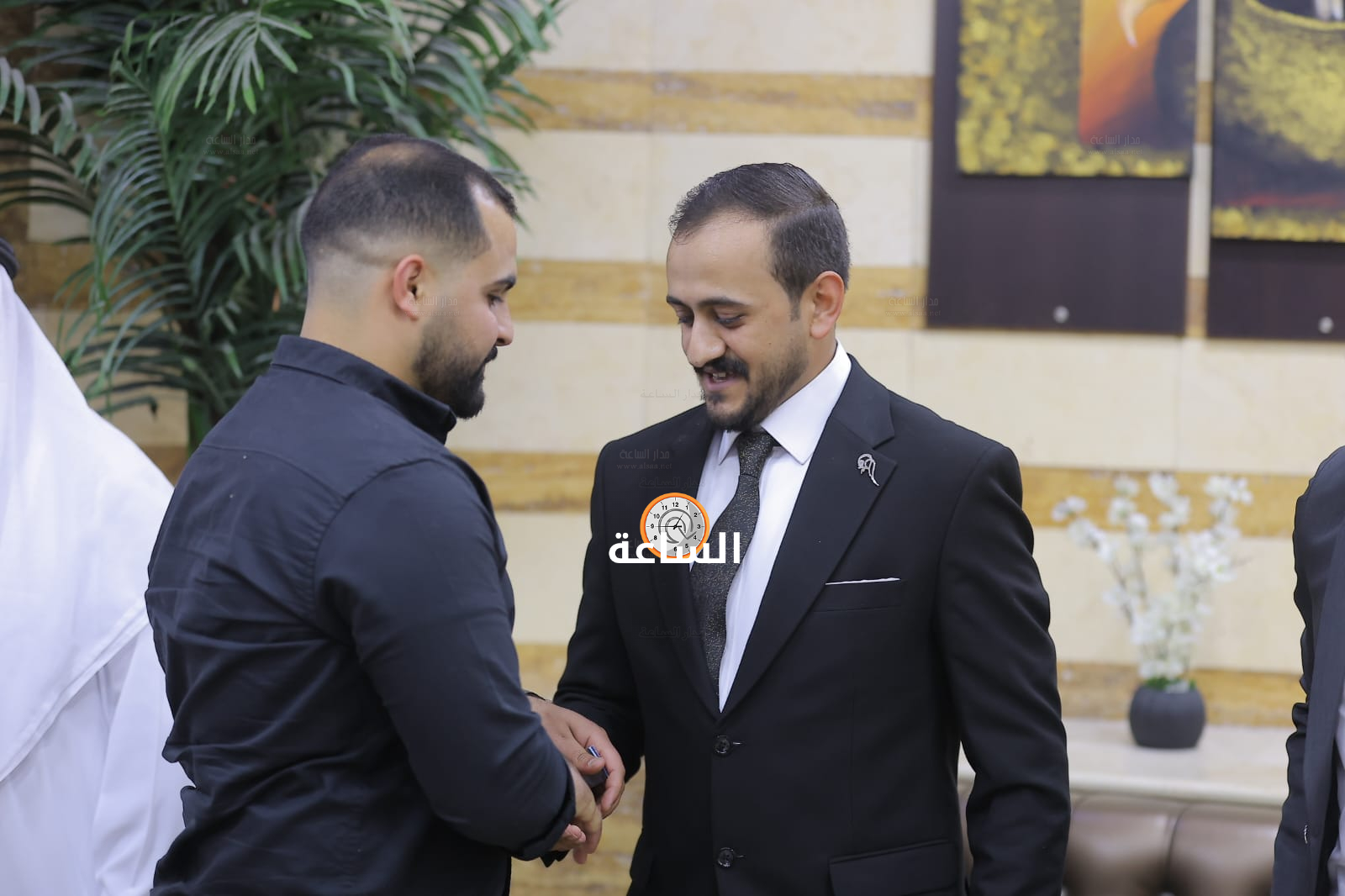 Madar Al-Saa Images 0.6359883593419943