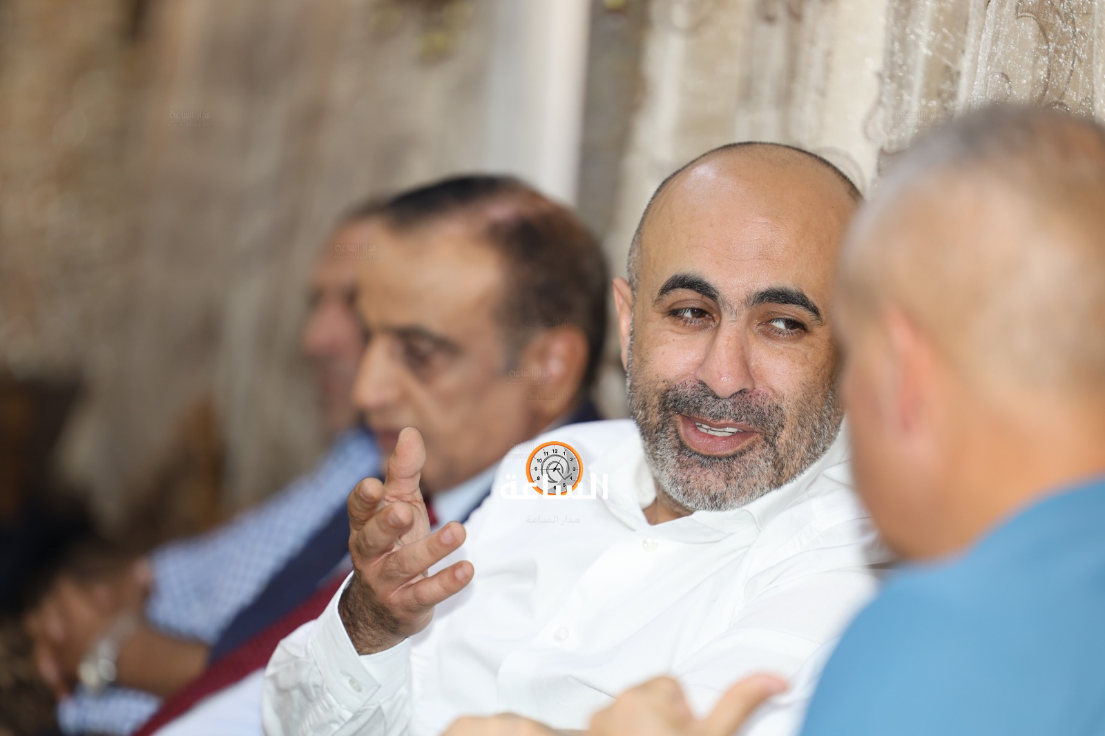 Madar Al-Saa Images 0.6049656970171947