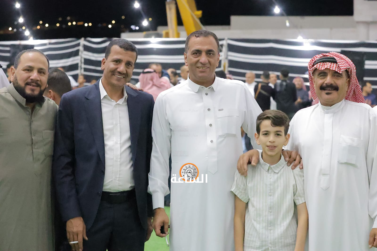 Madar Al-Saa Images 0.7529644549033122