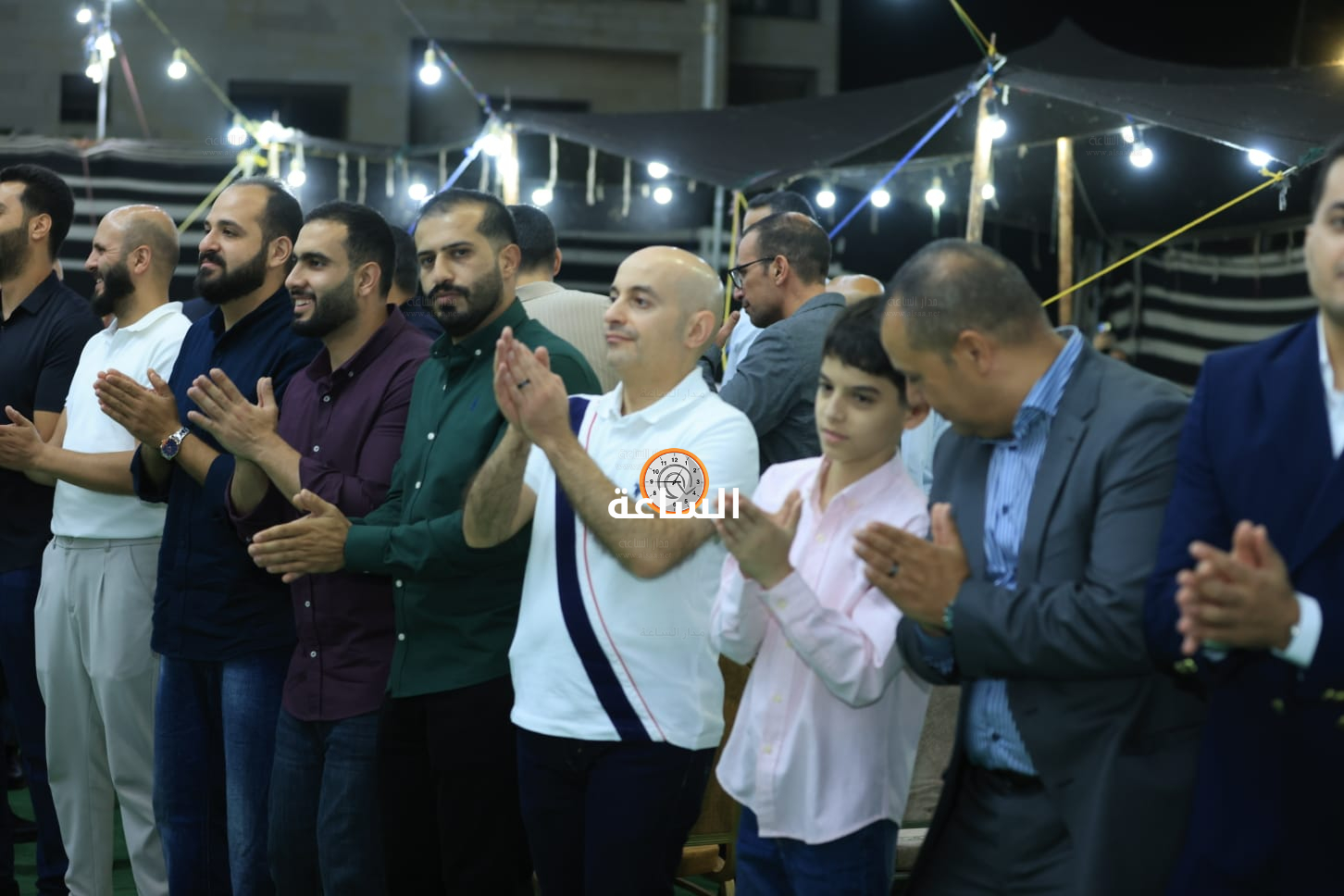 Madar Al-Saa Images 0.75622727343601
