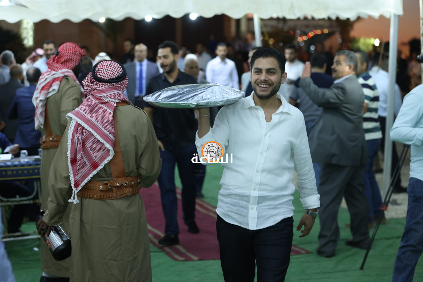 Madar Al-Saa Images 0.055280295714773
