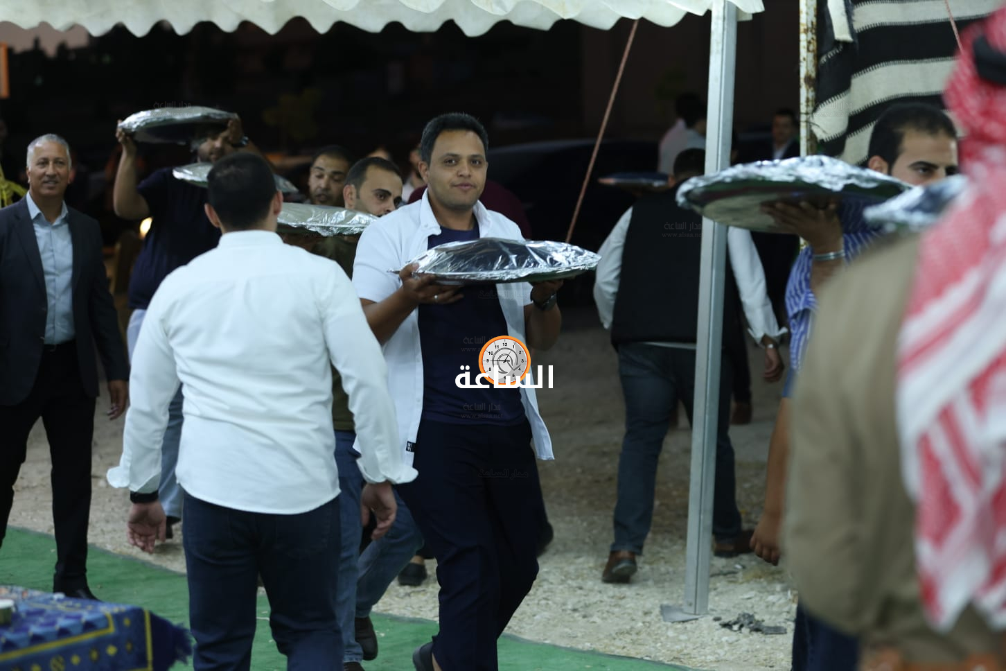 Madar Al-Saa Images 0.6969552383347357