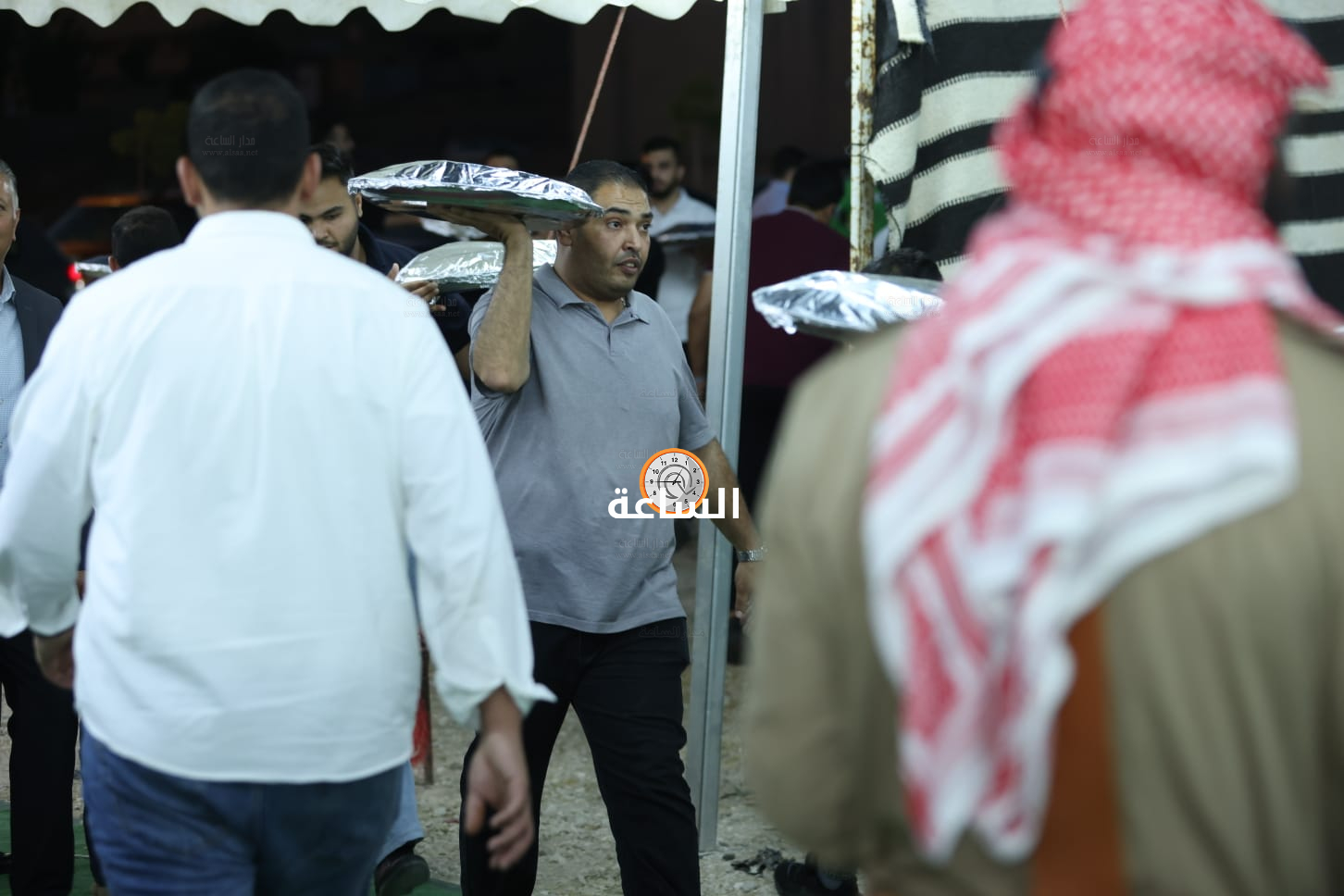 Madar Al-Saa Images 0.8437087615304929