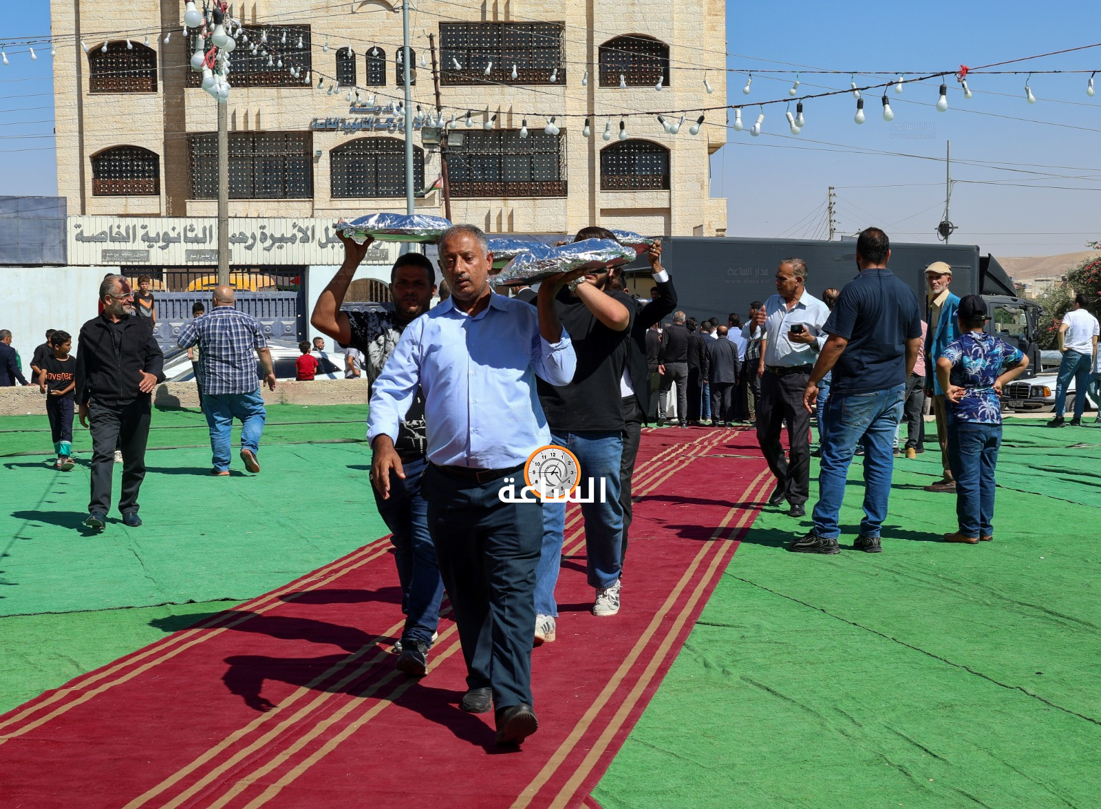 Madar Al-Saa Images 0.6895606198904456