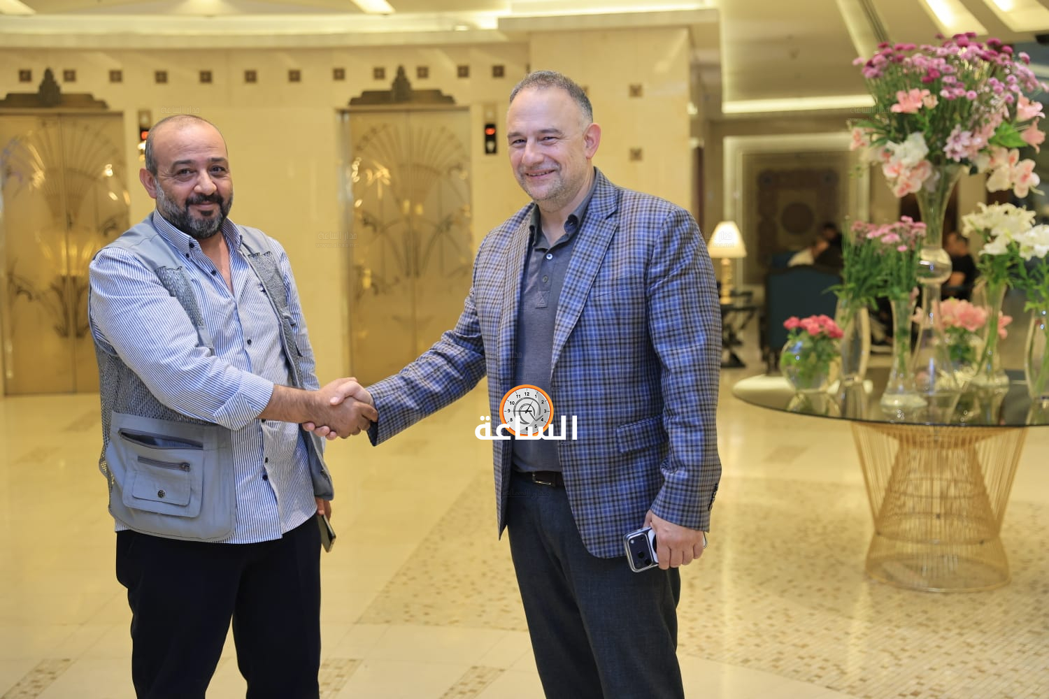 Madar Al-Saa Images 0.580554320195444