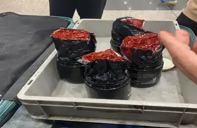 بعلب معسل.. أمن مطار القاهرة يكشف